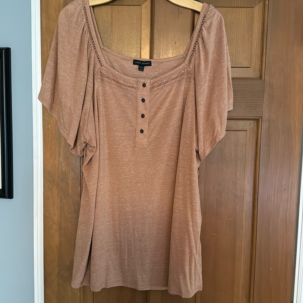 Cute little flutter sleeve T-shirt with a square neckline.